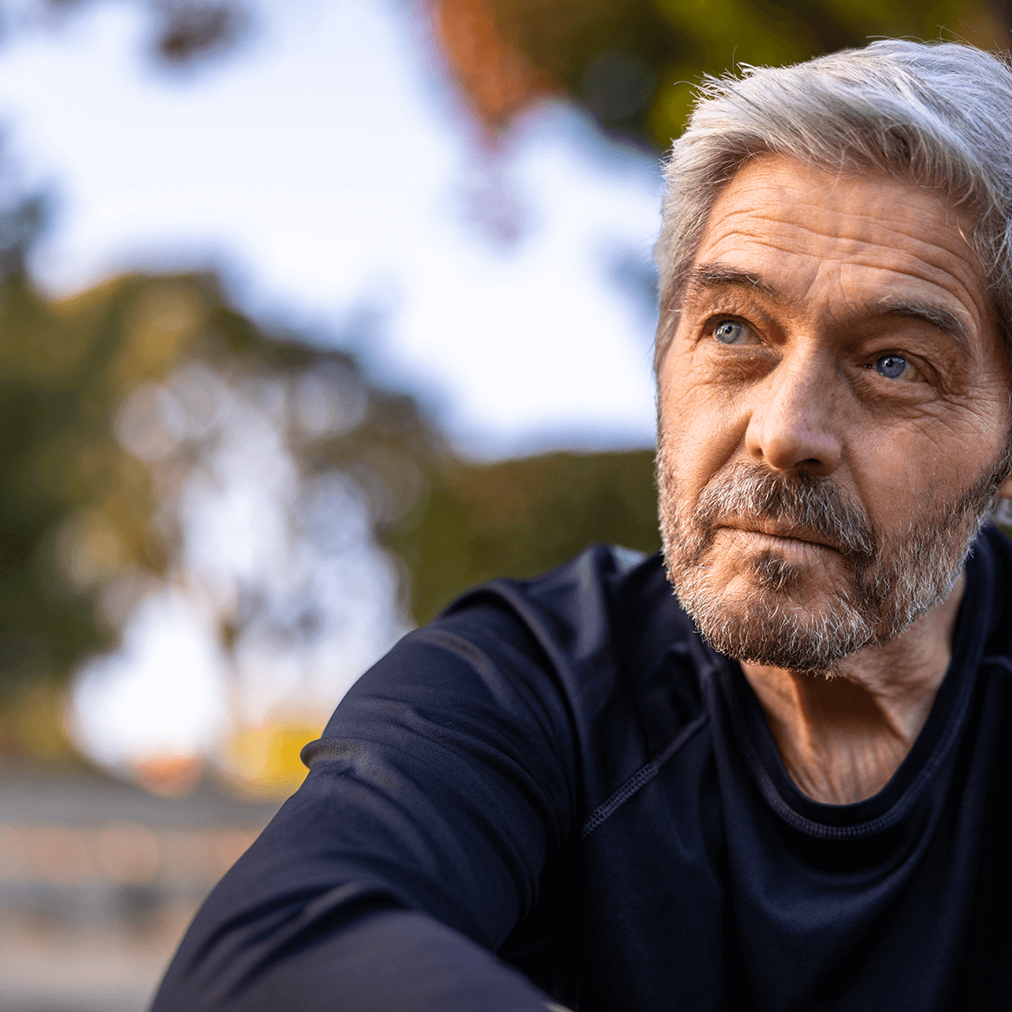 man looks off to the distance