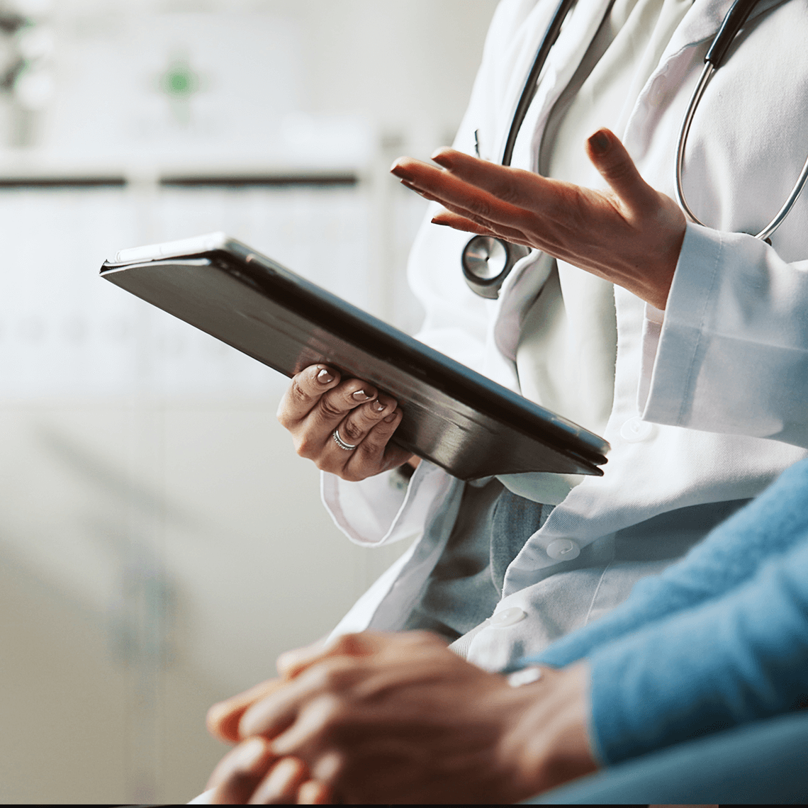 provider and patient shown talking